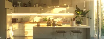 a sleek, modern kitchen with a spacious island, stove, and refrigerator forming a perfect work triangle layout.